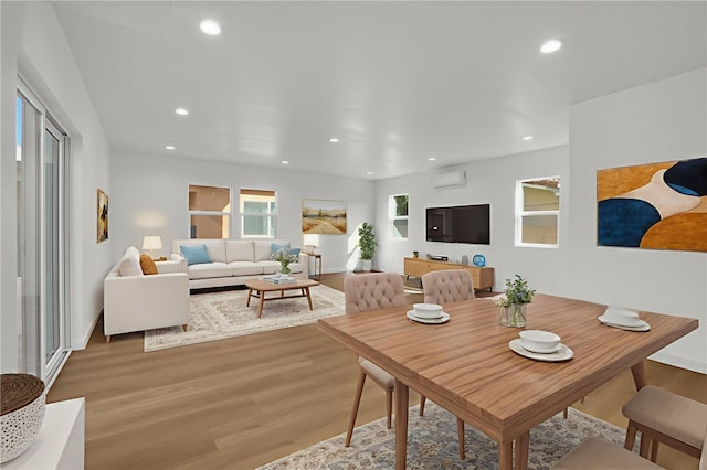 3032 Cogswell Rd, El Monte, CA 91732 - dining space featuring light wood-style floors, recessed lighting, and a wall mounted AC