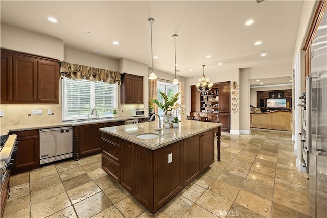 1109 Englemann Ct, Arcadia, CA 91006 - kitchen with dishwasher, recessed lighting, light stone countertops, an island with sink, and stone tile floors
