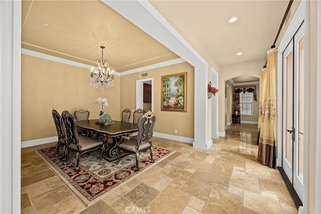 1109 Englemann Ct, Arcadia, CA 91006 - dining room featuring arched walkways, stone tile flooring, a chandelier, recessed lighting, and ornamental molding