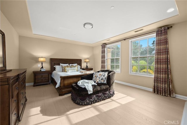 1109 Englemann Ct, Arcadia, CA 91006 - bedroom with a tray ceiling and light wood-style flooring