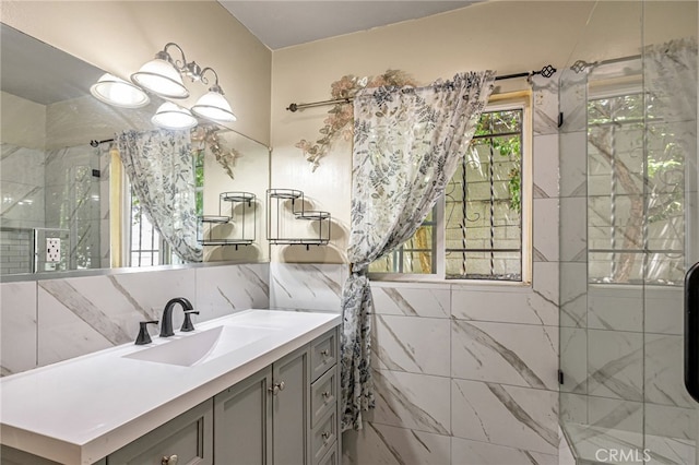 7134 Stansbury Ave, Van Nuys, CA 91405 - full bath featuring vanity, tile walls, a tile shower, and backsplash