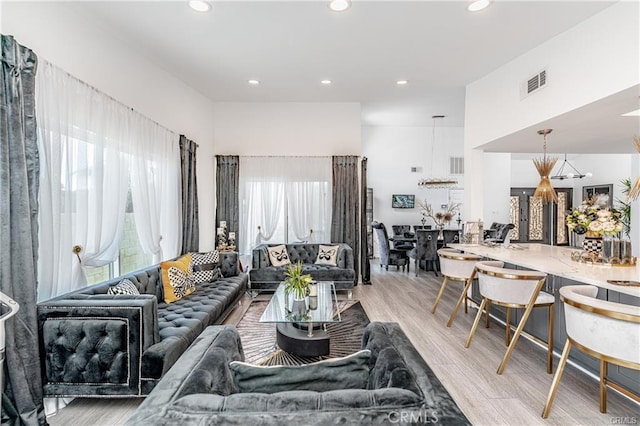 13800 Glenoaks Blvd, Sylmar, CA 91342 - living area featuring light wood-style floors and recessed lighting