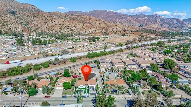 13800 Glenoaks Blvd, Sylmar, CA 91342 - aerial overview of property's location featuring mountains and nearby suburban area