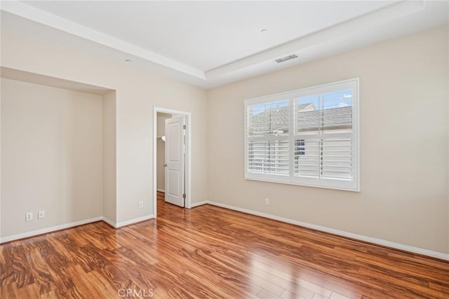 72 Peony, Irvine, CA 92618 - empty room featuring wood finished floors and baseboards