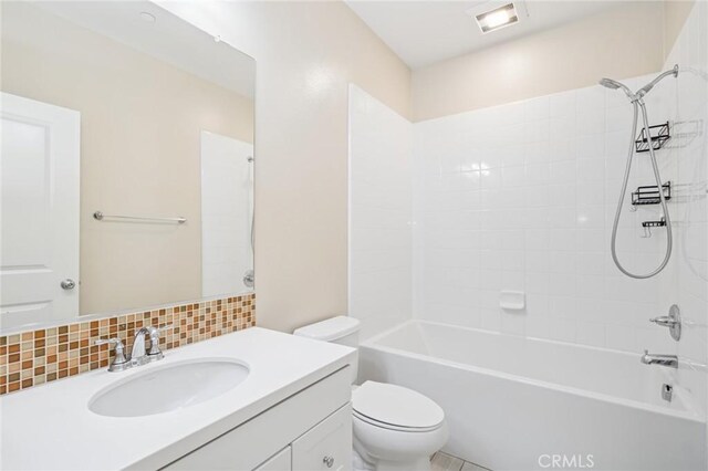 72 Peony, Irvine, CA 92618 - bathroom featuring vanity, shower / tub combination, and decorative backsplash