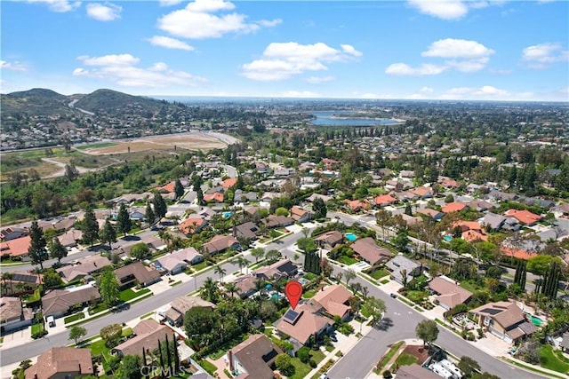 5706 E Bryce Ave, Orange, CA 92867 - aerial view of property's location featuring nearby suburban area and a water and mountain view
