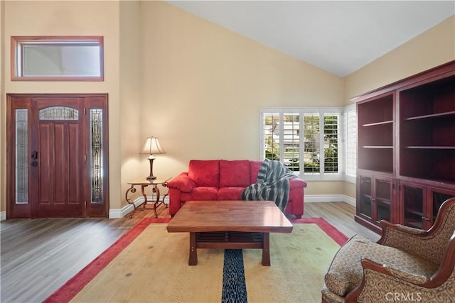 5706 E Bryce Ave, Orange, CA 92867 - living area with wood finished floors and high vaulted ceiling