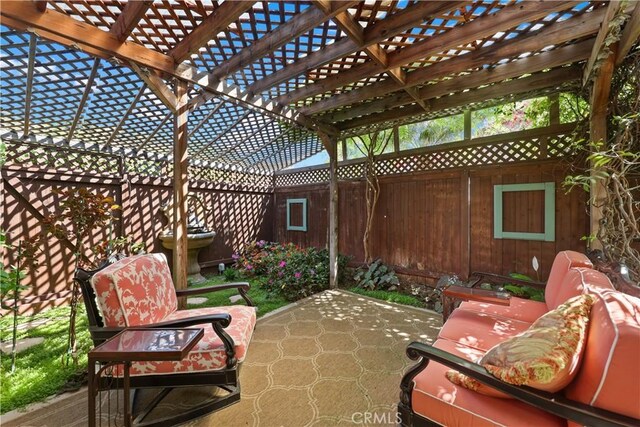 5706 E Bryce Ave, Orange, CA 92867 - fenced backyard with a patio and a pergola