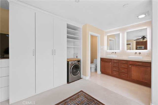 5706 E Bryce Ave, Orange, CA 92867 - laundry room featuring washer / clothes dryer and a ceiling fan