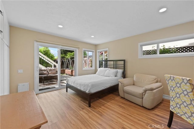 5706 E Bryce Ave, Orange, CA 92867 - bedroom featuring access to exterior, multiple windows, light wood finished floors, and recessed lighting