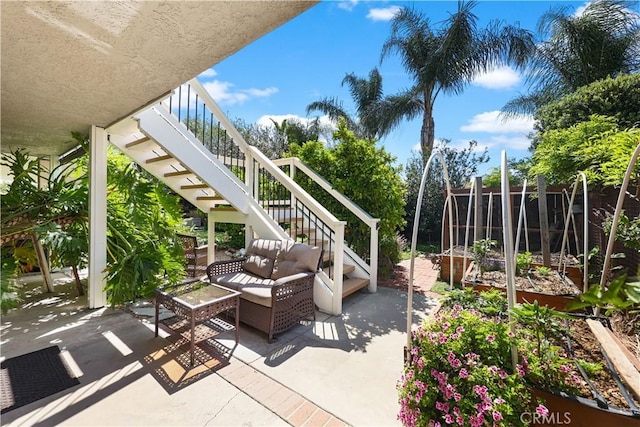 5706 E Bryce Ave, Orange, CA 92867 - view of patio / terrace with stairway, outdoor lounge area, and a garden