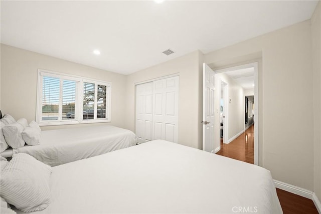 12077 Conference St, El Monte, CA 91732 - bedroom with dark wood-type flooring, a closet, and recessed lighting