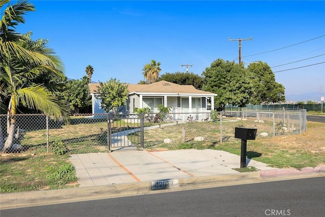 12077 Conference St, El Monte, CA 91732 - view of front of house with a fenced front yard and a gate