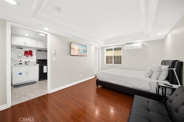 12077 Conference St, El Monte, CA 91732 - bedroom featuring a raised ceiling, a wall mounted AC, recessed lighting, and crown molding