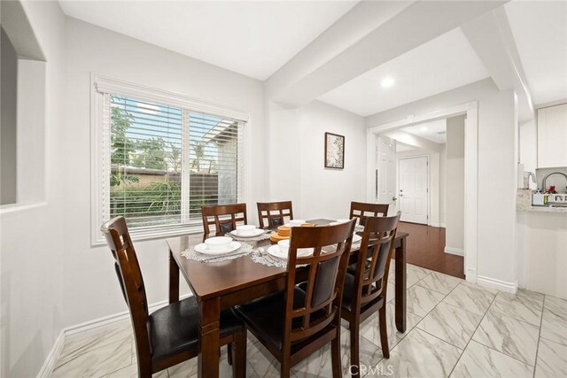 12077 Conference St, El Monte, CA 91732 - dining space with light marble finish flooring and recessed lighting