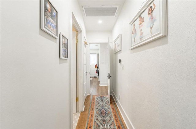 201 S Spruce St, Montebello, CA 90640 - hall featuring wood finished floors and baseboards