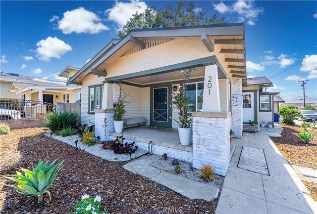 201 S Spruce St, Montebello, CA 90640 - view of front facade featuring a porch