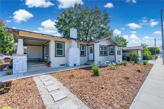 201 S Spruce St, Montebello, CA 90640 - view of front of house with a chimney and entry steps