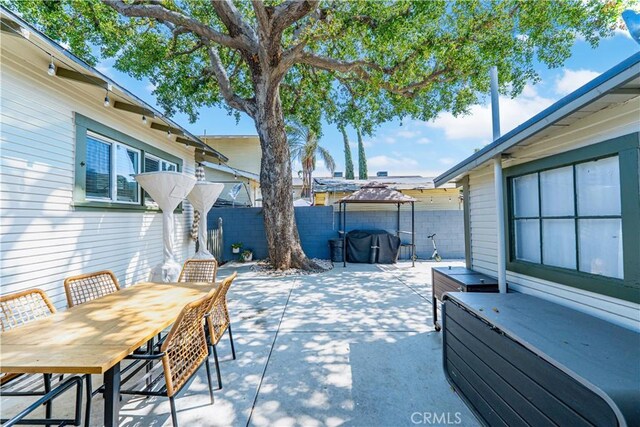 201 S Spruce St, Montebello, CA 90640 - view of patio with outdoor dining space and a gazebo
