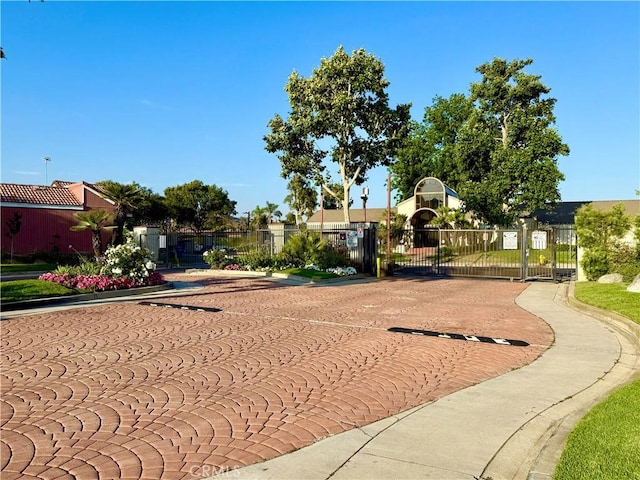 1639 Winn Ct, Pomona, CA 91768 - view of property's community featuring a gate and dirt driveway