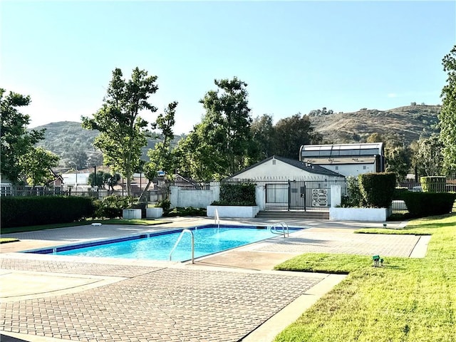1639 Winn Ct, Pomona, CA 91768 - community pool featuring a mountain view and a patio