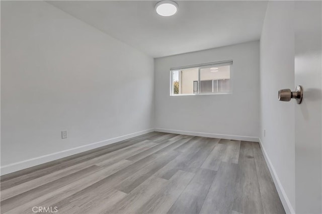 3265 Santa Fe Ave Unit 145, Long Beach, CA 90810 - spare room with wood finished floors and baseboards
