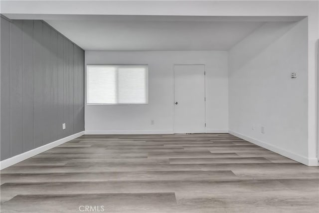 3265 Santa Fe Ave Unit 145, Long Beach, CA 90810 - empty room with baseboards and wood finished floors