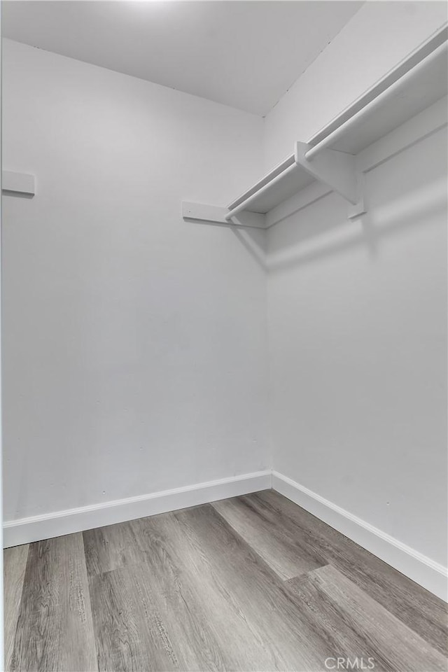 3265 Santa Fe Ave Unit 145, Long Beach, CA 90810 - spacious closet featuring wood finished floors