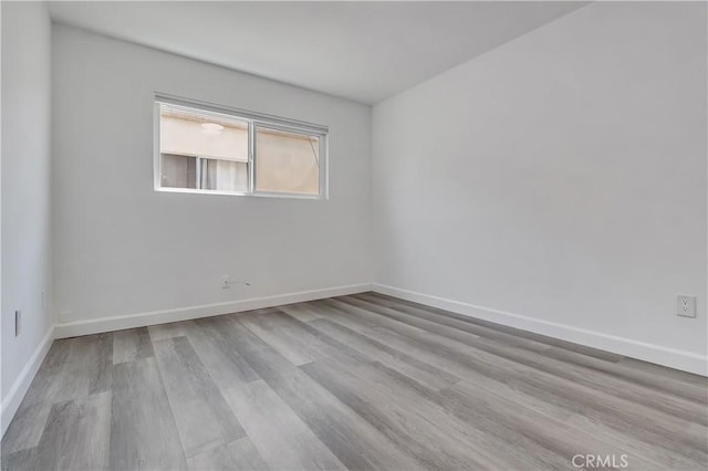 3265 Santa Fe Ave Unit 145, Long Beach, CA 90810 - unfurnished room with wood finished floors and baseboards