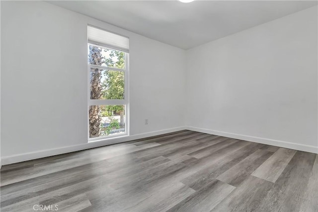3265 Santa Fe Ave Unit 145, Long Beach, CA 90810 - empty room featuring baseboards and wood finished floors
