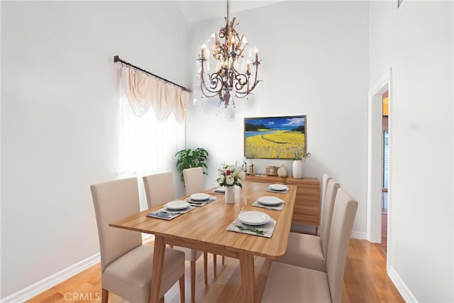24302 Vista Ridge Dr, Valencia, CA 91355 - dining area featuring a chandelier and light wood-style flooring