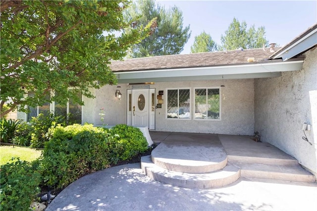 24302 Vista Ridge Dr, Valencia, CA 91355 - doorway to property featuring stucco siding