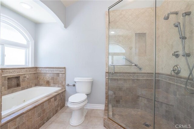 24302 Vista Ridge Dr, Valencia, CA 91355 - bathroom with a whirlpool tub, a shower stall, and tile patterned flooring