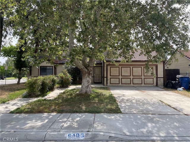 6106 Pathfinder Rd, Riverside, CA 92504 - obstructed view of property with concrete driveway and an attached garage