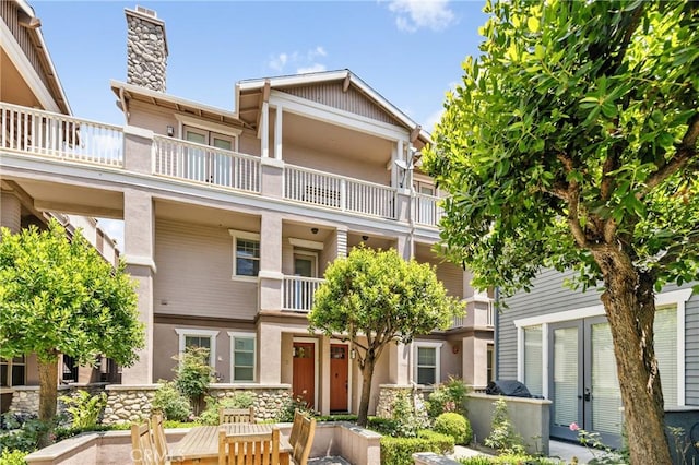 305 W Duarte Rd Unit G, Monrovia, CA 91016 - view of front of property with a balcony and a chimney