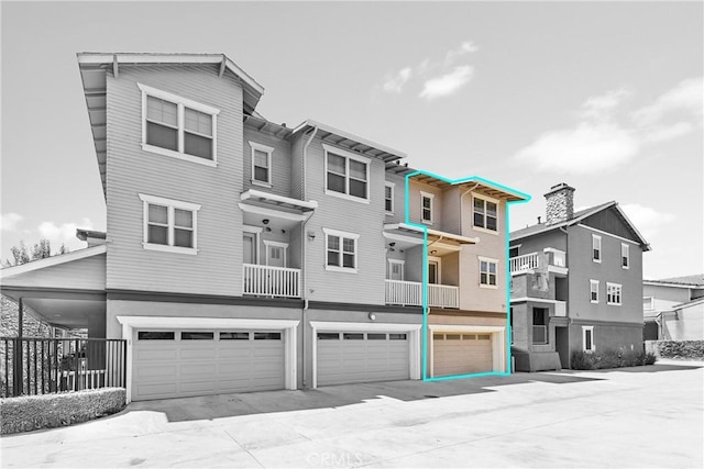 305 W Duarte Rd Unit G, Monrovia, CA 91016 - view of property featuring an attached garage