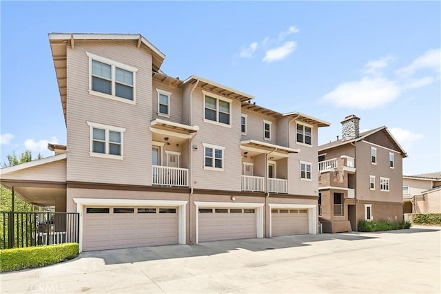 305 W Duarte Rd Unit G, Monrovia, CA 91016 - view of front of house with an attached garage and driveway