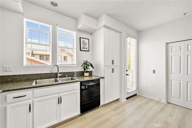 305 W Duarte Rd Unit G, Monrovia, CA 91016 - kitchen with black dishwasher, light wood-type flooring, and white cabinets