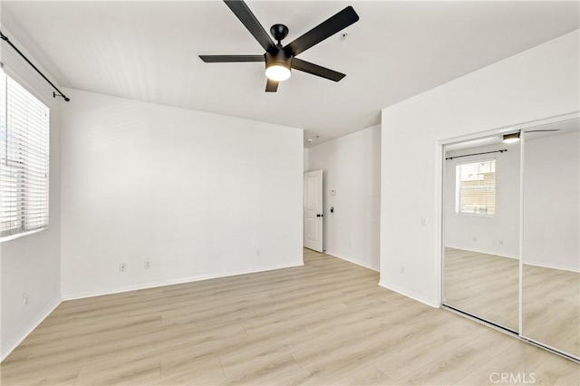 305 W Duarte Rd Unit G, Monrovia, CA 91016 - unfurnished bedroom with light wood-style flooring, a closet, and a ceiling fan