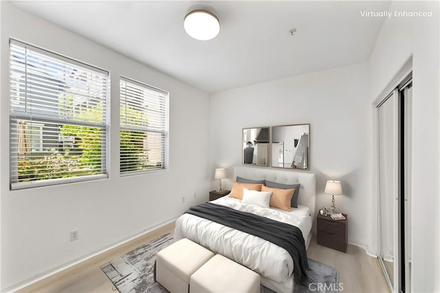305 W Duarte Rd Unit G, Monrovia, CA 91016 - bedroom with light wood-style flooring and baseboards