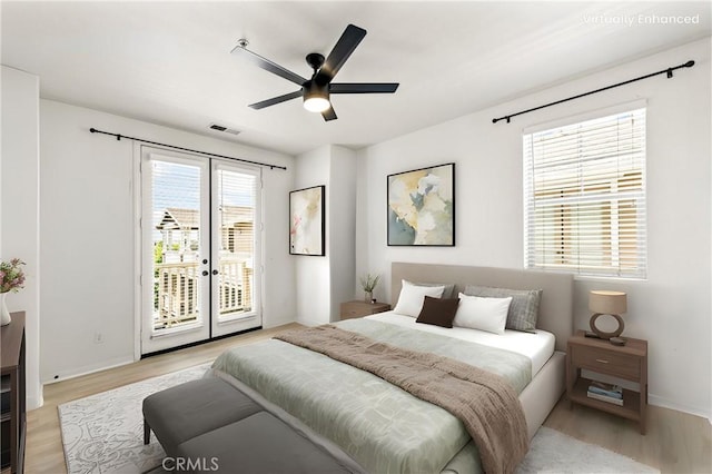 305 W Duarte Rd Unit G, Monrovia, CA 91016 - bedroom featuring access to exterior, light wood-type flooring, and a ceiling fan