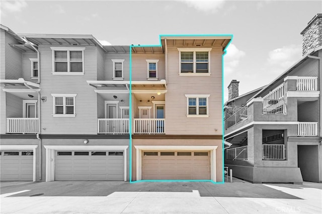 305 W Duarte Rd Unit G, Monrovia, CA 91016 - rear view of house featuring a garage