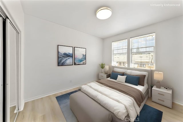 305 W Duarte Rd Unit G, Monrovia, CA 91016 - bedroom with light wood-type flooring and a closet