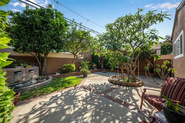 7028 E Parkcrest St, Long Beach, CA 90808 - fenced backyard with a patio area