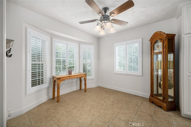 7028 E Parkcrest St, Long Beach, CA 90808 - home office featuring light tile patterned floors, healthy amount of natural light, and ceiling fan