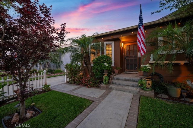 7028 E Parkcrest St, Long Beach, CA 90808 - view of front of home with a lawn