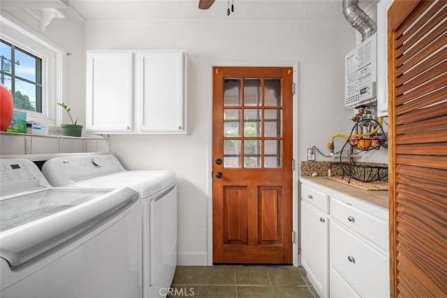 7028 E Parkcrest St, Long Beach, CA 90808 - laundry area featuring cabinet space, independent washer and dryer, ornamental molding, dark tile patterned flooring, and a ceiling fan