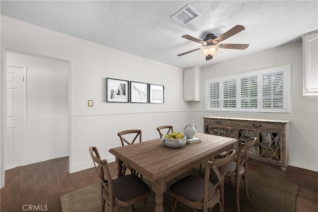 7028 E Parkcrest St, Long Beach, CA 90808 - dining area with a ceiling fan, dark wood finished floors, and ornamental molding
