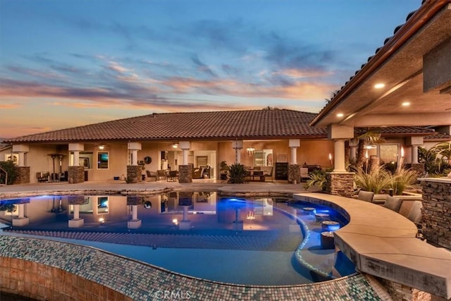 17180 Mockingbird Canyon Rd, Riverside, CA 92504 - pool at dusk with an outdoor pool and a patio
