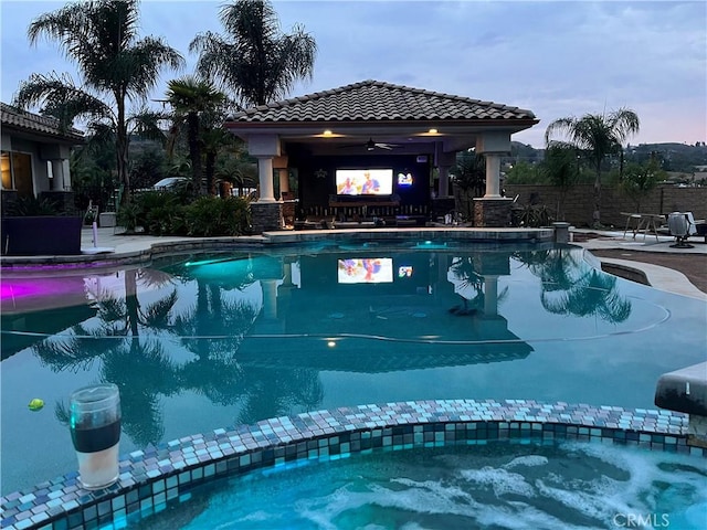 17180 Mockingbird Canyon Rd, Riverside, CA 92504 - view of swimming pool featuring a ceiling fan, a gazebo, a pool with connected hot tub, and a patio